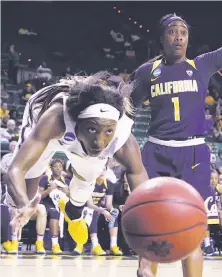  ?? Jerry Larson / Associated Press ?? LSU guard Raigyne Moncrief dives for the ball in front of Cal sophomore guard Asha Thomas during the first half.