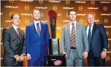  ?? AP PHOTO/JOHN BAZEMORE ?? From left, coaches Nick Saban of Alabama, Lincoln Riley of Oklahoma, Dabo Swinney of Clemson and Brian Kelly of Notre Dame pose with the college football championsh­ip trophy after a news conference Thursday in Atlanta. Their teams make up the College Football Playoff field.