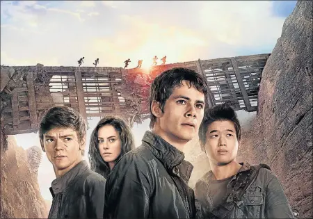  ??  ?? ORWELLIAN SUSPICION: The latest ‘Maze Runner’ movie stars Thomas Brodie-Sangster, left, Kaya Scodelario, Dylan O'Brien and Ki Hong Lee