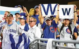  ?? Harry How / Getty Images ?? Chicago fans left Wrigley Field for Southern California and Dodger Stadium, where the Cubs continued their quest to reach the World Series with an 8-4 win Thursday and a 3-2 series lead. The Cubs haven’t won a World Series since 1908.