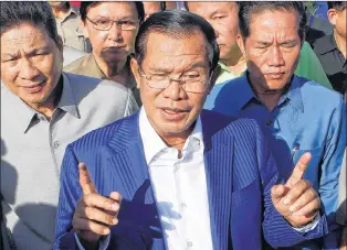  ?? HENG SINITH/THE ASSOCIATED PRESS ?? Cambodian Prime Minister Hun Sen gestures while speaking in Phnom Penh, Cambodia, Aug. 1. Determined to extend his 33 years as Cambodia’s strongman ruler, Hun Sen was not about to let an election derail what he believes is his destiny. The 65-year-old...