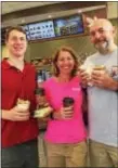  ?? SUSAN L. SERBIN — DIGITAL FIRST MEDIA ?? Friends Kent Coughlin, left, Kathy Hill and her husband, Dan Langille, are all borough residents within walking (or running) proximity to the newest Wawa in Media. They all paid a visit early Friday on the first day of business.