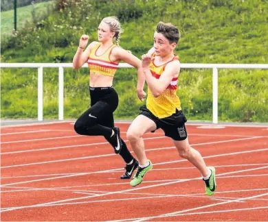  ??  ?? Contest Law’s Jade Gray and Owen Murphy battle it out on the track on their return to action. (Pics: Bobby Gavin)