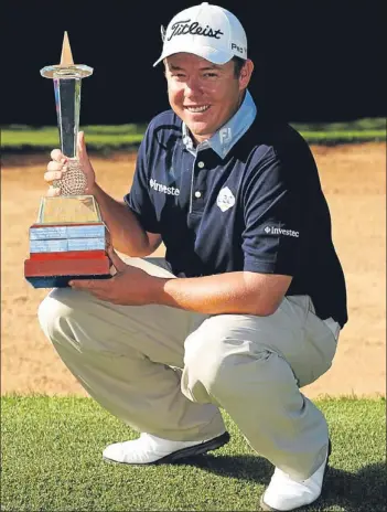  ?? Picture: Getty Images. ?? George Coetzee with the Joburg Open trophy after his three-shot victory.