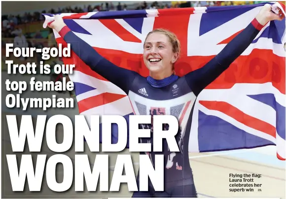  ?? PA ?? Flying the flag: Laura Trott celebrates her superb win