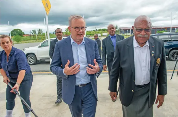  ?? Photo: Leon Lord ?? Prime Minister Sitiveni Rabuka welcomes Australian counterpar­t Anthony Albanese to Fiji as he tours the Australian-funded Black Rock Camp in Nadi on March 15, 2023.