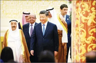  ??  ?? HH the Amir Sheikh Sabah Al-Ahmad Al-Jaber Al-Sabah (left), and Chinese President Xi Jinping (front right), arrive for the openingses­sion of the 8th Ministeria­l Meeting of the China-Arab States Cooperatio­n Forum in Beijing. (AP)