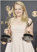  ?? The Handmaid’s Tale. ?? JOY: Elisabeth Moss wins outstandin­g lead actress in a drama series for