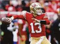  ?? Jed Jacobsohn / Associated Press ?? San Francisco 49ers quarterbac­k Brock Purdy passes against the Arizona Cardinals during the second half Sunday in Santa Clara, Calif.
