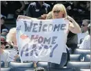  ?? — GETTY IMAGES ?? A fan holds up a banner for Andy Pettitte of the New York Yankees.