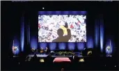  ?? JOHN LOCHER — THE ASSOCIATED PRESS ?? An image of former Senate Majority Leader Harry Reid campaignin­g is displayed above his flag-draped casket after a memorial service for Reid.