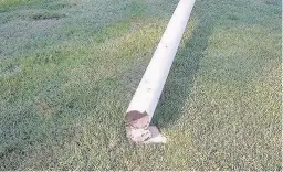  ??  ?? Snapped Vandals broke the base of the flag pole in Cambuslang Park, less that 24 hours after it had been erected