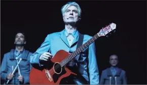  ?? Andy Kropa / Associated Press ?? Musician David Byrne performs at the Broadway reopening of “David Byrne’s American Utopia” at the St. James Theatre on Sunday in New York.