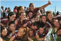  ?? PHOTO BY SEB DALY/SPORTSFILE ?? Galway players celebrate with the trophy after their victory over Mayo in the Connacht Ladies Senior Football final