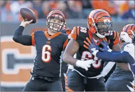  ?? [GARY LANDERS/THE ASSOCIATED PRESS] ?? Bengals quarterbac­k Jeff Driskel was sacked four times and had an intercepti­on and a fumble in his first start, a penalty-plagued loss to the Broncos last week.
