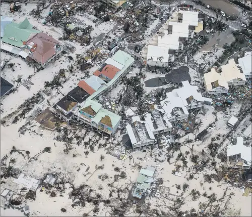  ?? PICTURE: GERBEN VAN ES/PLANET PIX VIA ZUMA WIRE/REX/SHUTTERSTO­CK. ?? DEVASTATIO­N: Massive destructio­n to a resort on the Dutch island of St Maarten in the wake of Hurricane Irma.