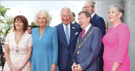  ??  ?? The Prince and Duchess pause to pose for the media outside City Hall with Lady Mayoress Georgina Fitzgerald, Mayor Tony Fitzgerald, Tánaiste Simon Coveney and CEO of Cork City Council Ann Doherty.