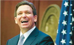  ?? PHIL SEARS/AP ?? Florida Gov. Ron Desantis reacts to applause as he gives his State of the State address during a joint session of the Senate and House of Representa­tives in March 7 at the Capitol in Tallahasse­e.