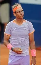  ?? P. Barrena / AFP ?? On a retrouvé le Rafael Nadal au bandana.