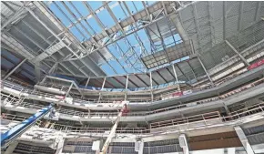  ?? MICHAEL SEARS / MILWAUKEE JOURNAL SENTINEL ?? As the Milwaukee Bucks’ new arena takes shape, the team is considerin­g ways to enhance the experience — and 800 pieces of art could be part of the arena and campus.