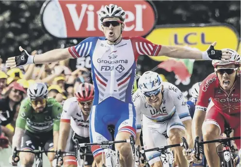  ?? PICTURE: JEFF PACHOUD/AFP/GETTY ?? 0 French sprinter Arnaud Demare spreads his arms in triumph after winning stage 18 of the Tour de France.