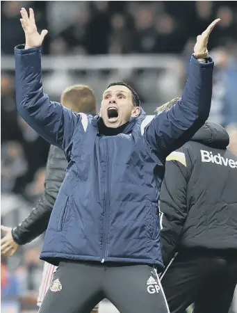  ??  ?? Former Sunderland manager Gus Poyet celebrates a victory at St James’s Park.