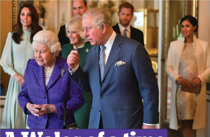  ??  ?? Celebratio­n: The Queen and Charles with Kate, Camilla, William, Harry and Meghan at Buckingham Palace yesterday