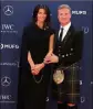  ??  ?? David Coulthard (F) et sa conjointe, Karen Minier.