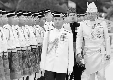  ??  ?? Sultan Nazrin (right) inspects the guard of honour in conjunctio­n with the ruler’s 61st birthday celebratio­n at Istana Iskandaria­h in Bukit Chandan. — Bernama photo