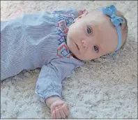  ?? NANCY KING/CAPE BRETON POST ?? Jessica Leyte’s 14-week-old daughter, Violet, may be small for her age, but she’s healthy. Before Leyte received her liver transplant, she never thought becoming a mother would be possible.