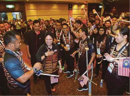  ?? PIC BY LUQMAN HAKIM ZUBIR ?? Malaysian Paralympic Council patron Tun Jeanne Abdullah at the torch handing over ceremony yesterday.