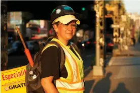  ?? Corner. Photograph: Wilfred Chan/The Guardian ?? Elizabeth Reyes, 51, gets constructi­on jobs by waiting at a designated Brooklyn street