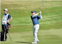  ??  ?? Brad Kennedy plays from the fairway during his brilliant round of 62 at Millbrook.