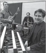  ??  ?? The Michael Bartlett Trio — (from left) Michael Bartlett, guitar; Micah Boswell, drums; and Brian Hamby, organ — plays a Mardi Gras jazz and bebop concert Tuesday at North Little Rock’s St. Luke’s Episcopal Church.