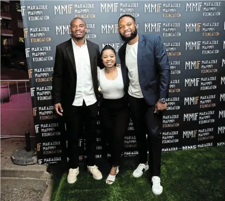  ?? Picture: SUPPLIED ?? WINNING WAYS: PR company owner Sibabalwe Sesmani is flanked by two of her Springbok clients, Makazole Mapimpi and Lukhanyo Am.