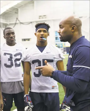  ?? UConn Athletics ?? UConn defensive back Shamel Lazarus, left, is one of three true freshmen to take part in spring drills for the Huskies.