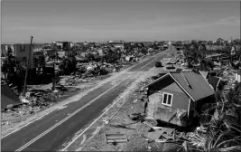  ?? ASSOCIATED PRESS ?? THIS PHOTO SHOWS DEBRIS and destructio­n in Mexico Beach, Fla., Friday after Hurricane Michael went through the area Wednesday. Mexico Beach, the ground-zero town, was nearly obliterate­d, an official said Friday as the scale of the storm’s fury became clearer.