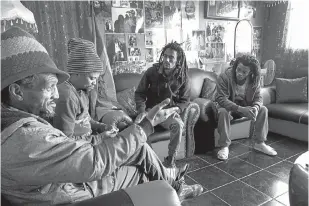  ??  ?? HIGHER LOVE Angelo Kapank (second from right) is completing his national diploma in logistics management. He was inspired by the Rastafari movement: “They made me realise that I need to seek higher education in order to liberate the youth in my community from poverty and crime.”