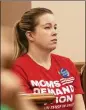  ??  ?? Elizabeth Graham, an educator in Aldine and a member of the Moms Demand Action advocacy group, listens to testimony on Tuesday.