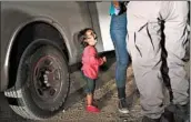  ?? JOHN MOORE/GETTY ?? Sandra Sanchez is searched as Yanela, 1, cries in an image that came to symbolize families separated at the border.