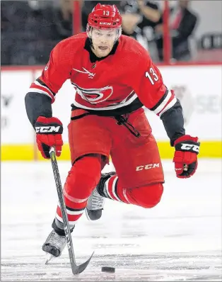  ?? AP PHOTO ?? Carolina Hurricanes’ Warren Foegele skates against the Tampa Bay Lightning during a pre-season game in Raleigh, N.C., on Sept. 19