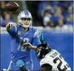  ?? DUANE BURLESON — THE ASSOCIATED PRESS ?? Detroit Lions quarterbac­k
Jared Goff, left, is pressured by Jacksonvil­le Jaguars linebacker Foyesade Oluokun Sunday.