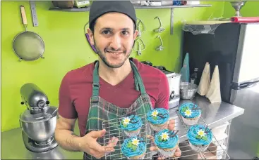  ?? KENN OLIVER/ THE TELEGRAM ?? Tulip Baroo Bakery owner Matthew Finateri shows off some of the cupcake creations coming from his kitchen. After six years of exclusivel­y offering his baked goods through wholesale and custom orders, Finateri will open a storefront location in July.