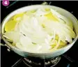  ??  ?? Add the thinly sliced onion to the potatoes. Gently toss to incorporat­e.
7