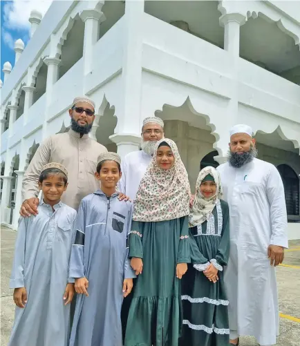  ?? Photo: Laiseana Nasiga ?? Samabula Jame Masjid Maulana Abdul Alim with Mufti Sher Khan and Mulfti Zaeem Zarib with Usaidur Rhman,Ubaidur Rahman, Raqeebah Ishrat and Mukarramah Uzhma.