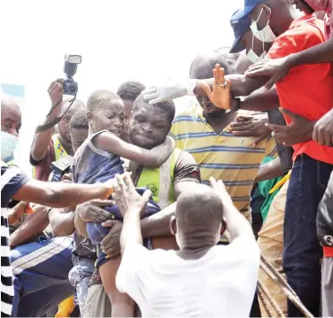  ??  ?? Pupils rescued at the scene of a collapsed building that housed a school at Ita-Faji Street, Lagos Island yesterday