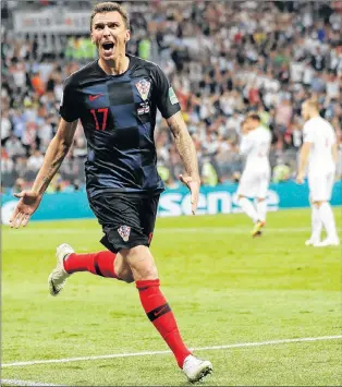  ?? AP PHOTO ?? Croatia’s Mario Mandzukic celebrates after scoring his side’s second goal during the semifinal match with England at the World Cup Wednesday in Moscow, Russia.