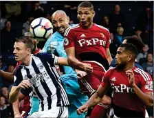  ?? Picture: REUTERS ?? SOAR POINT: Richarliso­n leaps to secure a draw for Watford