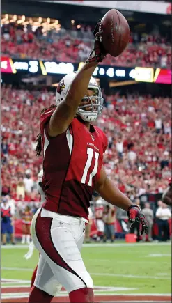  ??  ?? Arizona Cardinals wide receiver Larry Fitzgerald (11) celebrates his touchdown against the San Francisco 49ers.