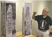  ?? COURTESY KRQE NEWS 13 ?? Using foam replicas during a 2017 television interview with KRQE News 13, author and researcher Louis Serna discusses the symbols carved into the legendary and mysterious stone pillars that have led him to believe they are of Knights Templar origin.